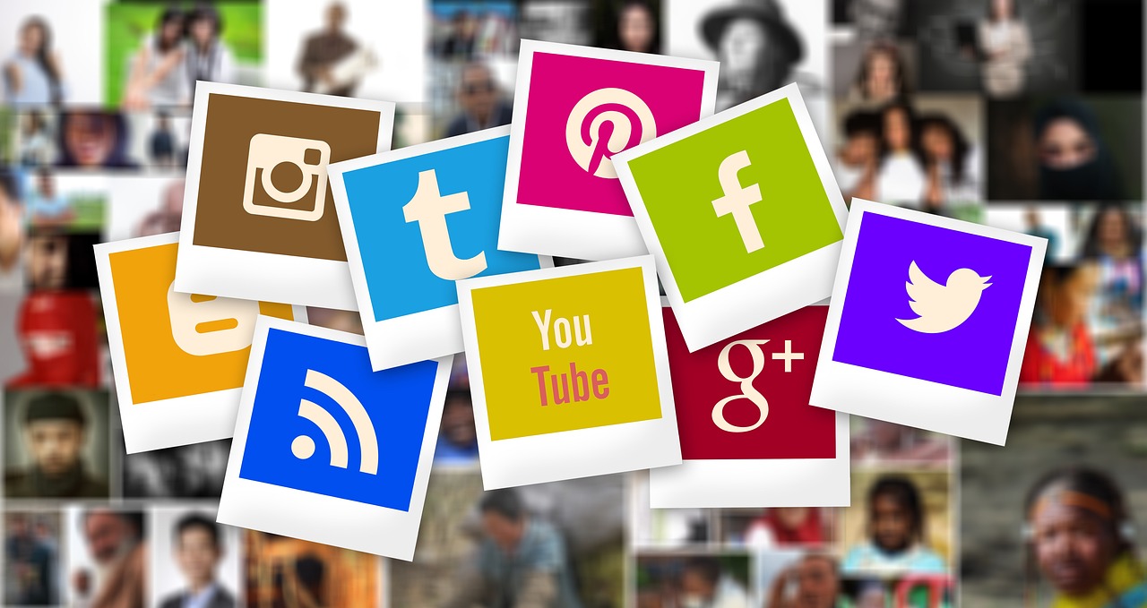 Social Media Icons such as Facebook and Twitter on background with people's pictures